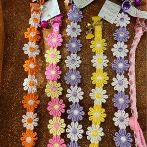 ORIGINAL DOG COLLARS!!DOG COLLARS DECORATED W/FLOWERS AND DIFFERENT DECORATIONS.